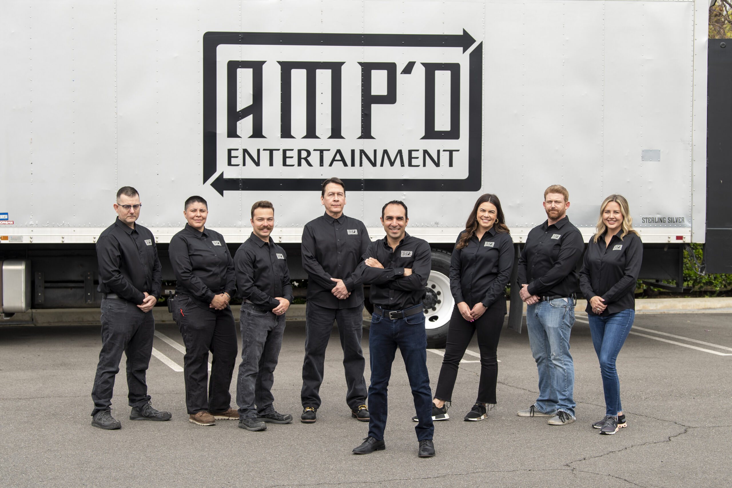 ampd entertainment leadership team in front of ampd entertainment silver truck